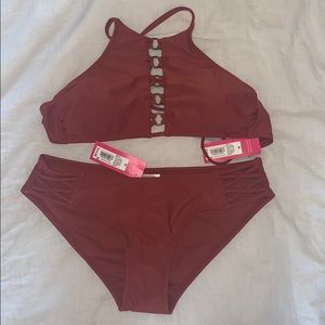 Auburn halter top swimsuit with matching bottoms.